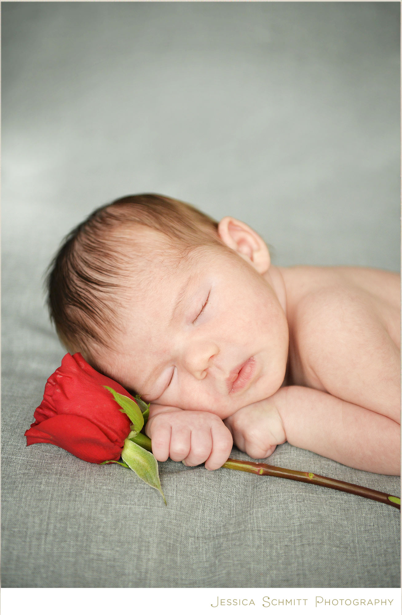 newborn baby photography pose with flower rose