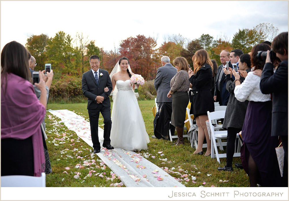 bride walks down aisle wedding photography